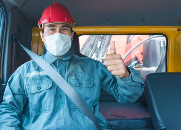 istock Truck driver wearing a mask 1216583945