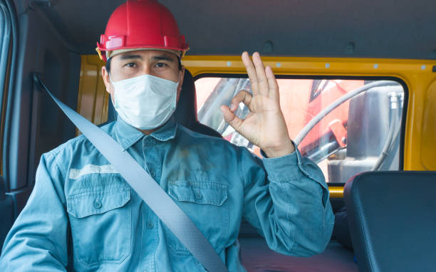 istock Truck driver wearing a mask 1216583946