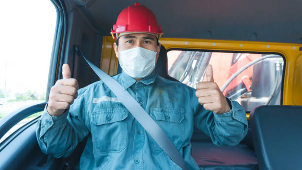 istock Truck driver wearing a mask 1216583952