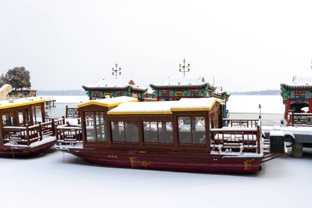 istock boats  covered with snow 1216585160