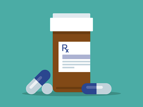 Prescription pill bottle and pills