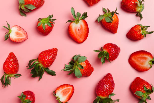 istock Strawberry on pink background 1216586389
