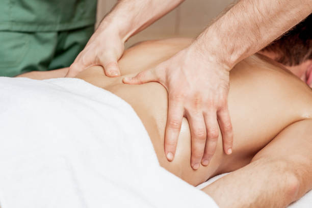 istock Back massage on back of man. 1216587896