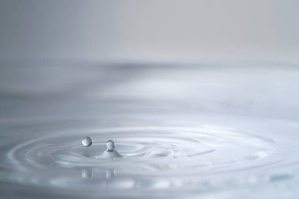 Abstract background of water ripple at the moment of dropping water drops.