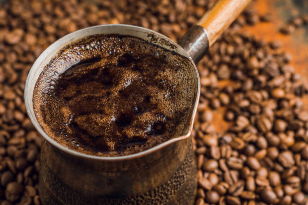 istock Freshly making coffee in vintage cezve 1216590711