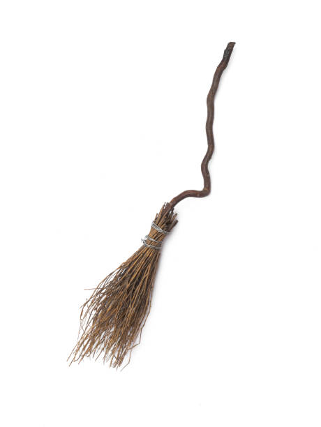 istock old wooden broom isolated on white background 1216593047