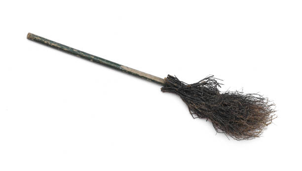 istock old wooden broom isolated on white background 1216593254