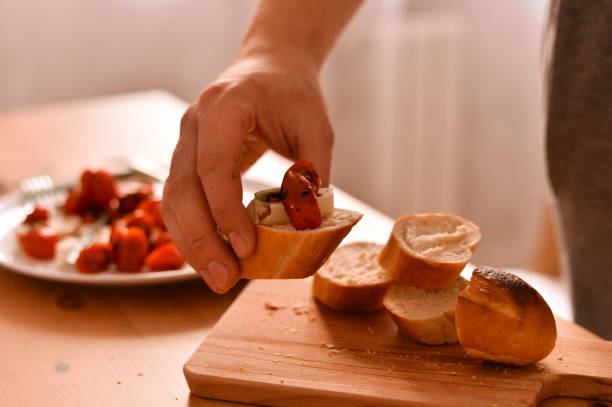 istock A sandwich with fresh bread, cheese and tomatoes 1216596315