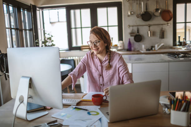 istock Young woman working from home 1216606910