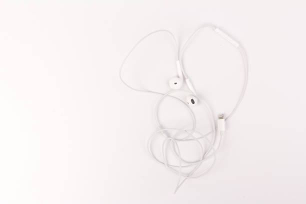 istock White headphones with headset on white isolated background 1216607121