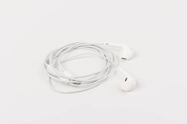 istock White headphones with headset on white isolated background 1216607133