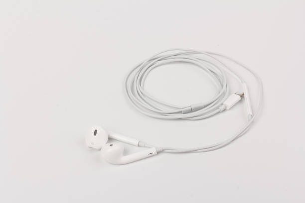istock White headphones with headset on white isolated background 1216607165