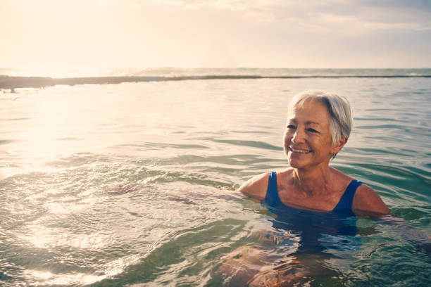istock Life is better when you're swimming 1216609163