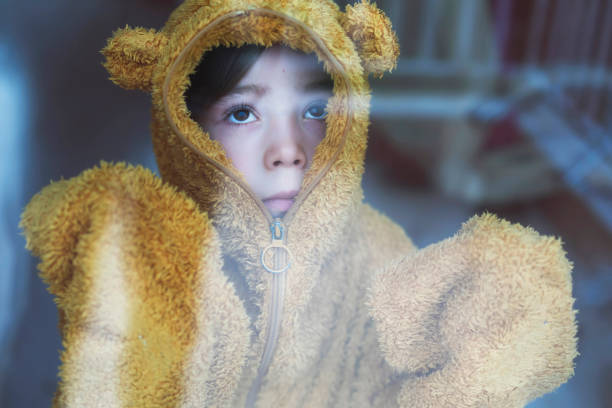istock Sad child in isolation at home 1216611091