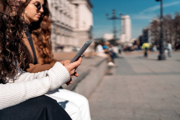 istock Two caucasian women using smartphones 1216611840