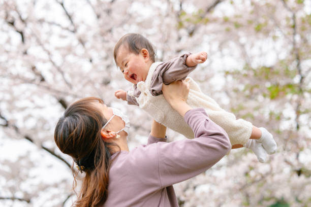 istock Mother enjoying with her baby 1216614932