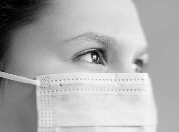 istock Young girl wearing face mask 1216616374
