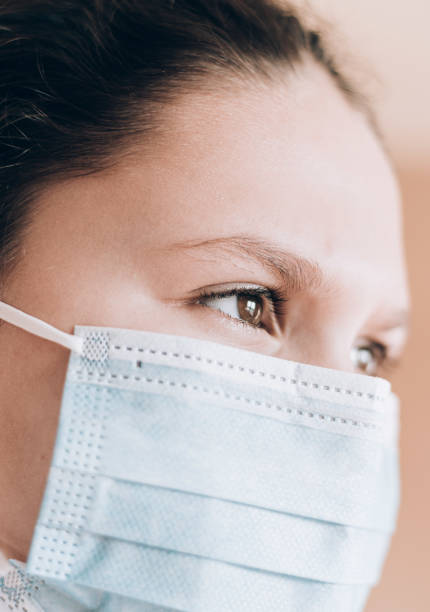 istock Young girl wearing face mask 1216616425