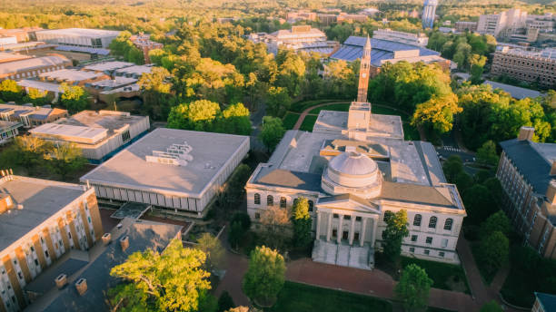 Aerial over the University of North Carolina in the Spring Aerial over the University of North Carolina at Chapel Hill in the spring. university of north carolina stock pictures, royalty-free photos & images