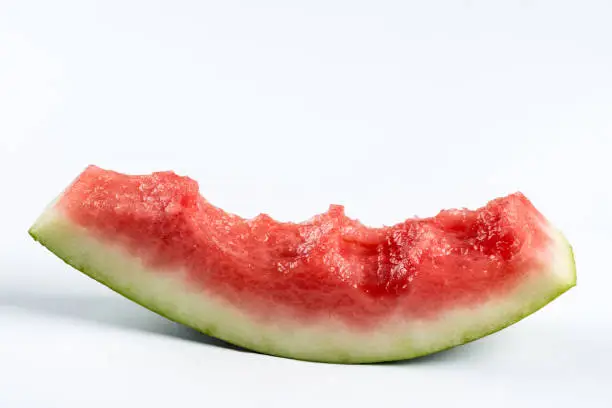 Watermelon leftovers isolated above white background.