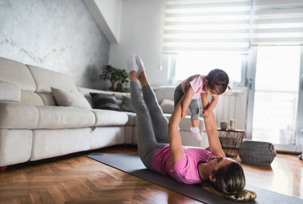 istock Helping mommy to get fit 1216622393