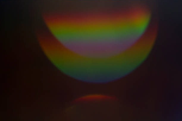istock Lens flare and light leak haze on black background 1216628094