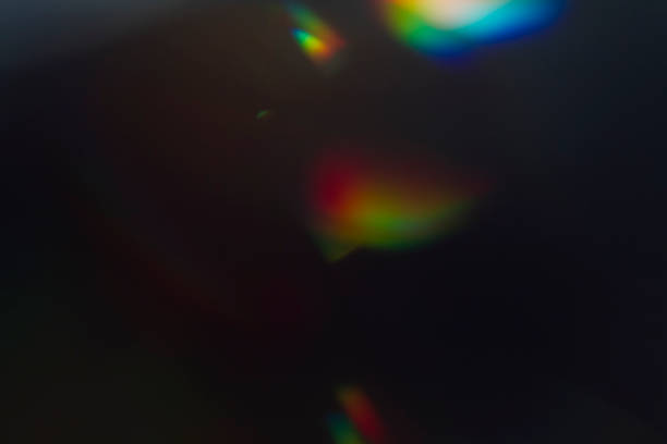 istock Lens flare and light leak haze on black background 1216628165