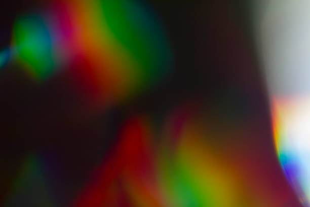 istock Lens flare and light leak haze on black background 1216628281