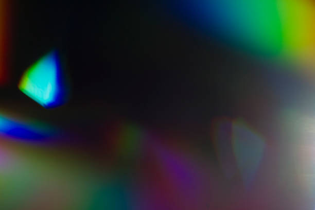 istock Lens flare and light leak haze on black background 1216628342