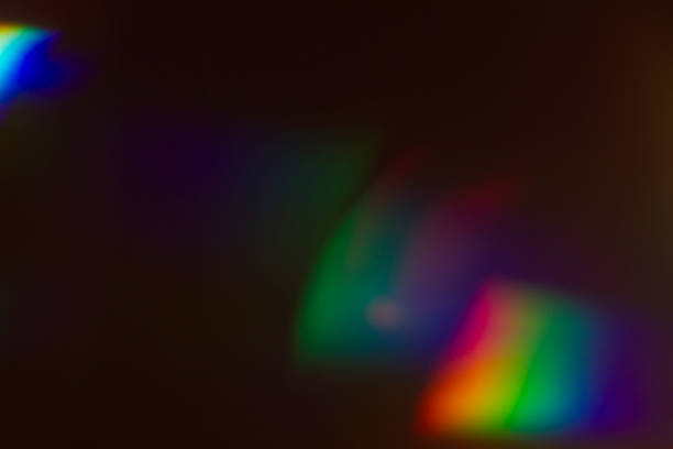 istock Lens flare and light leak haze on black background 1216628396