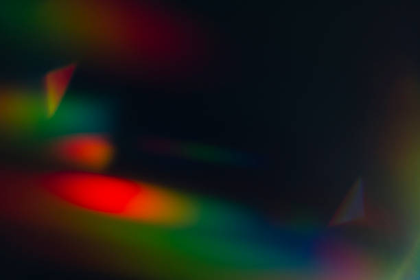 istock Lens flare and light leak haze on black background 1216628398