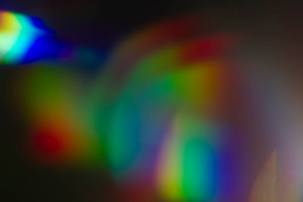 istock Lens flare and light leak haze on black background 1216628433