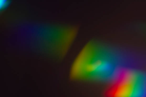 istock Lens flare and light leak haze on black background 1216628436