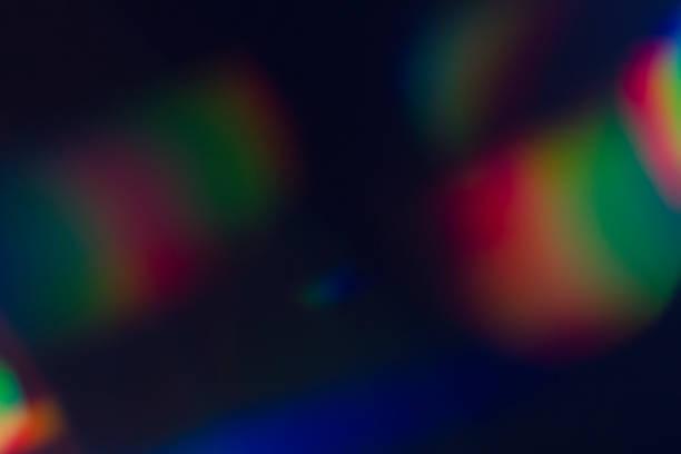 istock Lens flare and light leak haze on black background 1216628460