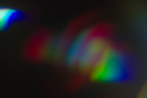 istock Lens flare and light leak haze on black background 1216628463
