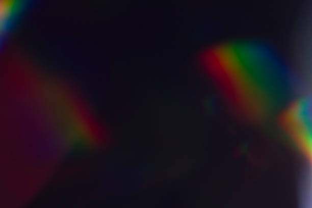 istock Lens flare and light leak haze on black background 1216628467