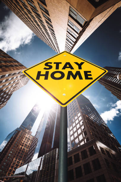 istock stay home road sign in manhattan 1216634907