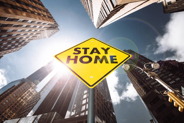 istock stay home road sign in manhattan 1216635047