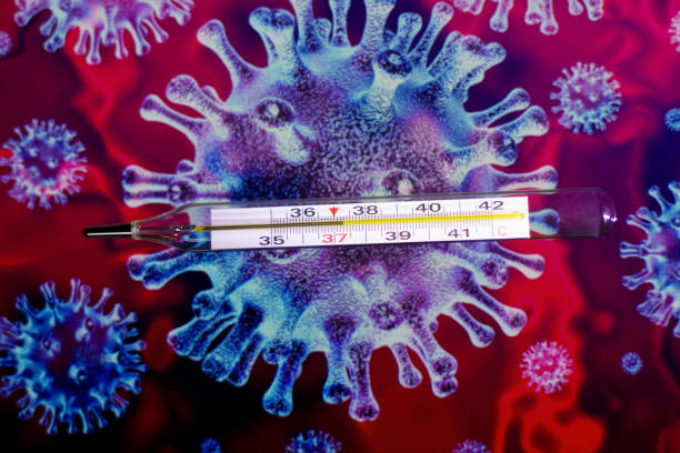istock A thermometer and pills on the background of the coronavirus 1216636484