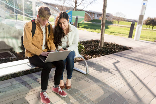 istock Male and female college students study together 1216637608