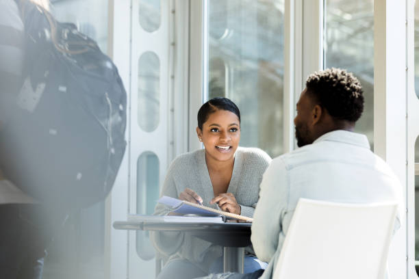 istock College couple enjoy studying together 1216637648