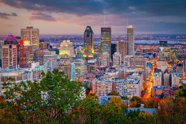 Montreal Sunset Twilight Skyscraper Cityscape Quebec Canada Montreal Cityscape - Skyscaper Skyline View at Sunset Twilight under colorful skyscape. Montreal, Quebec, Canada montreal stock pictures, royalty-free photos & images