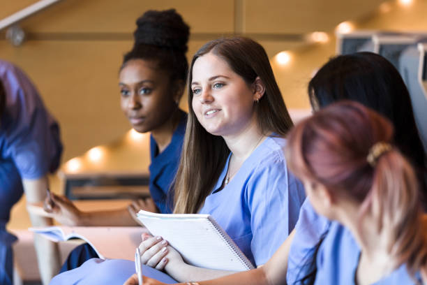 istock Confident young adult female nursing school student 1216638563