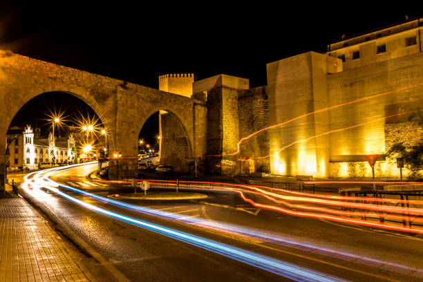 istock night photo on viaduct with light trail 1216638804