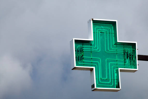 istock Pharmacy sign , green cross symbol. 1216641850