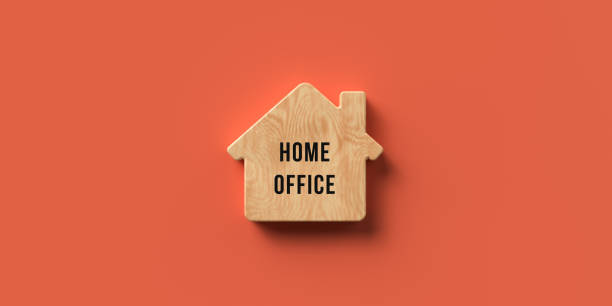 istock wooden house symbol with text HOME OFFICE - 3D rendered illustration 1216643806