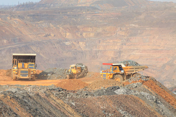 istock Big dump truck takes out empty stone to dump 1216647036
