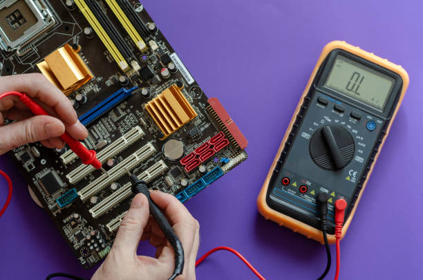 istock Repairing the motherboard. 1216648429