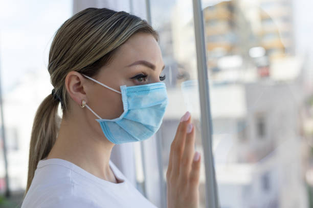istock Woman in isolation at home 1216649405