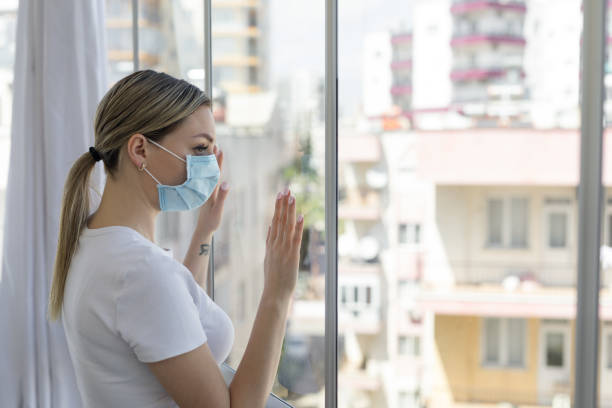 istock Woman in isolation at home 1216649430